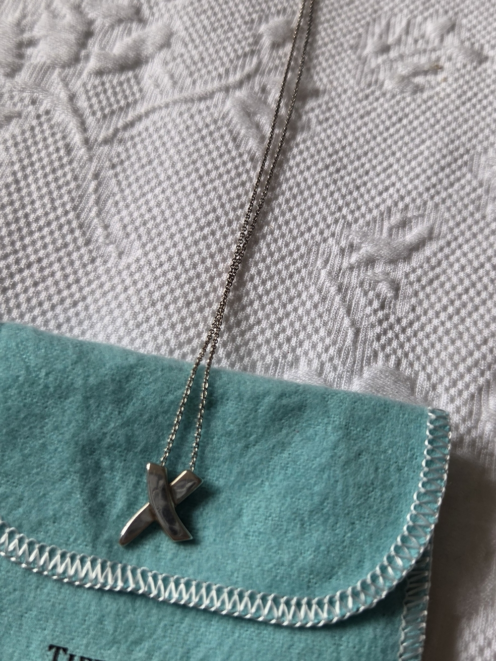 Tiffany & Co. Silver 'X' Pendant Necklace with Turquoise Pouch